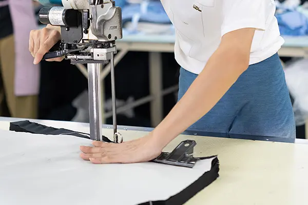 fabric cutting table for custom shirt orders