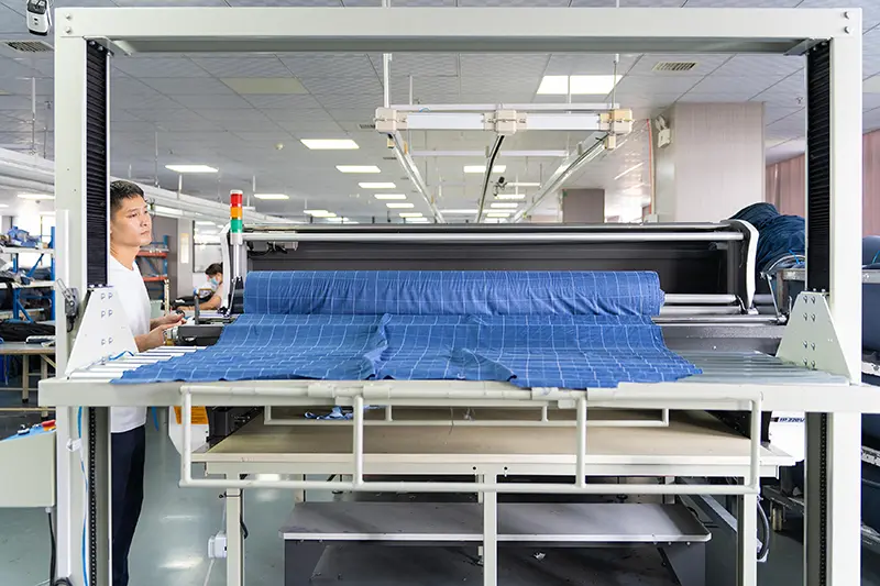 fabric inspection before custom shirt cutting