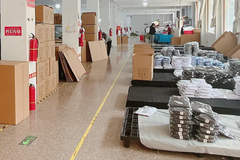 packed shirt cartons stored in factory warehouse