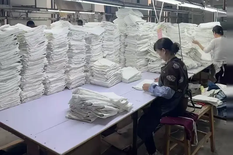 Finished custom shirts ready for final inspection before shipment