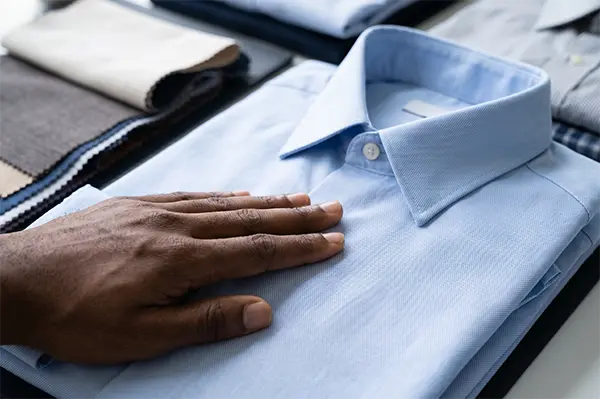Custom corporate shirts fabric and appearance consistency