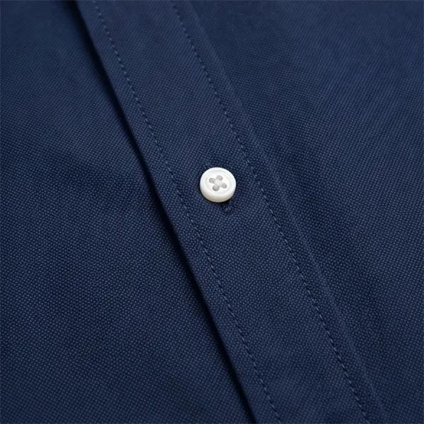 custom corporate shirt label and button detail